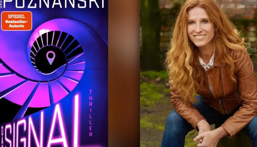 Ursula Poznanski, Autorin des Thrillers "Das Signal", mit roten Haaren und brauner Lederjacke.